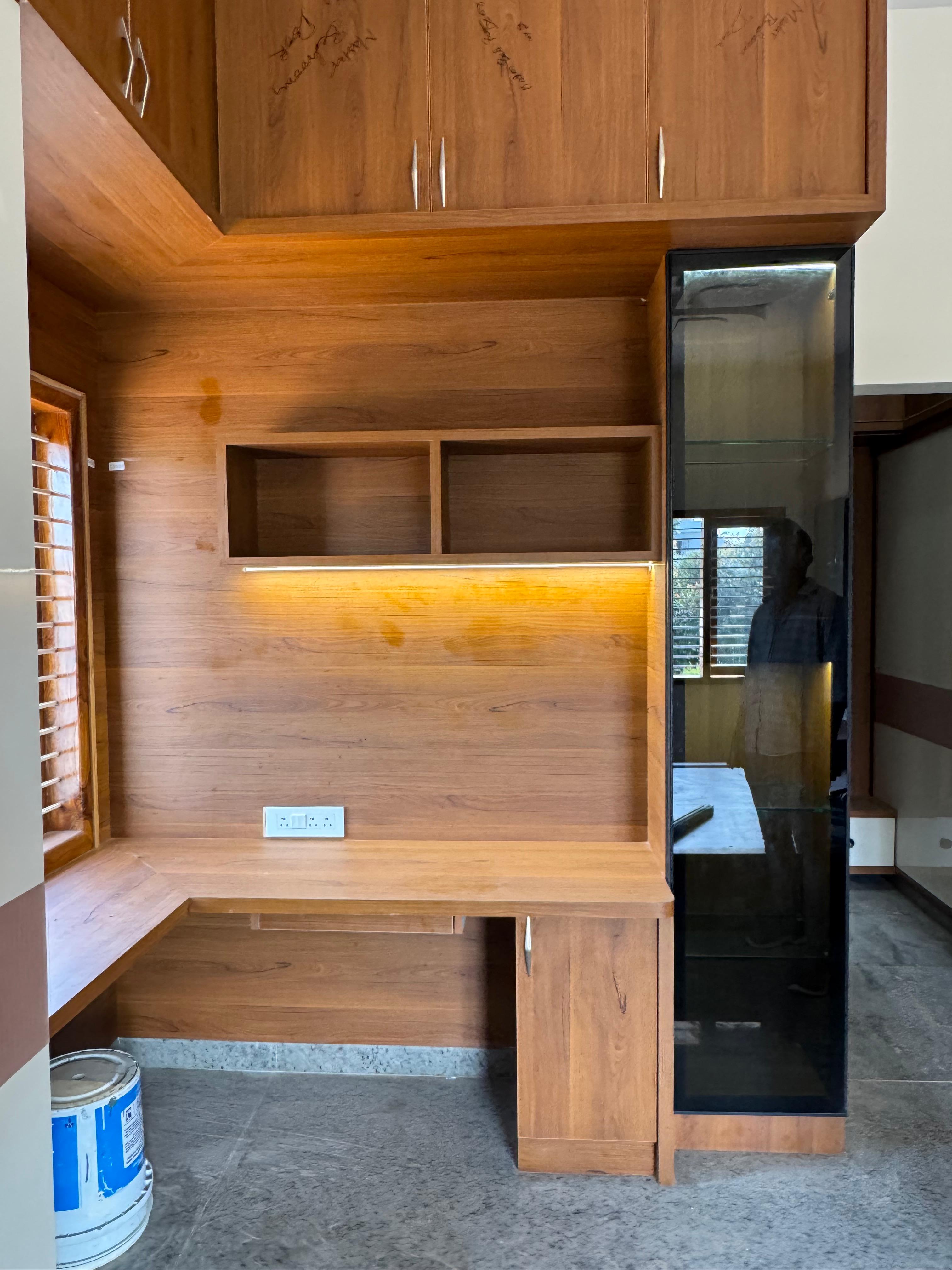 Wood study unit with overhead storage and warm task lighting