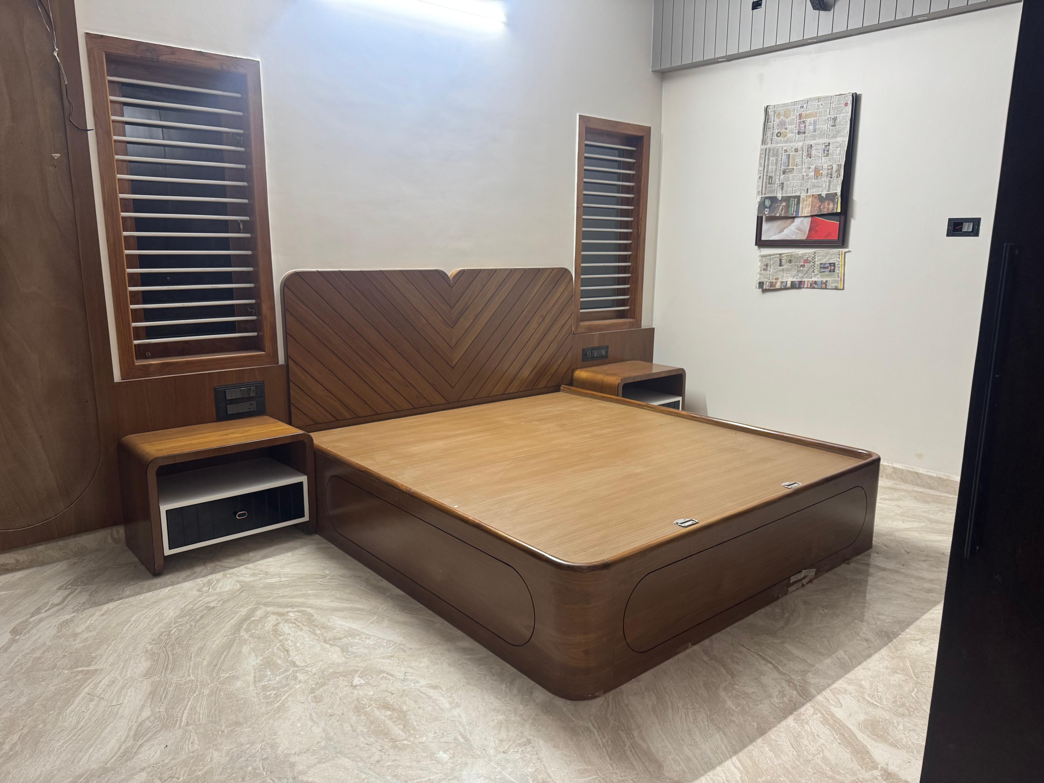 Wooden bedroom cot with matching side tables